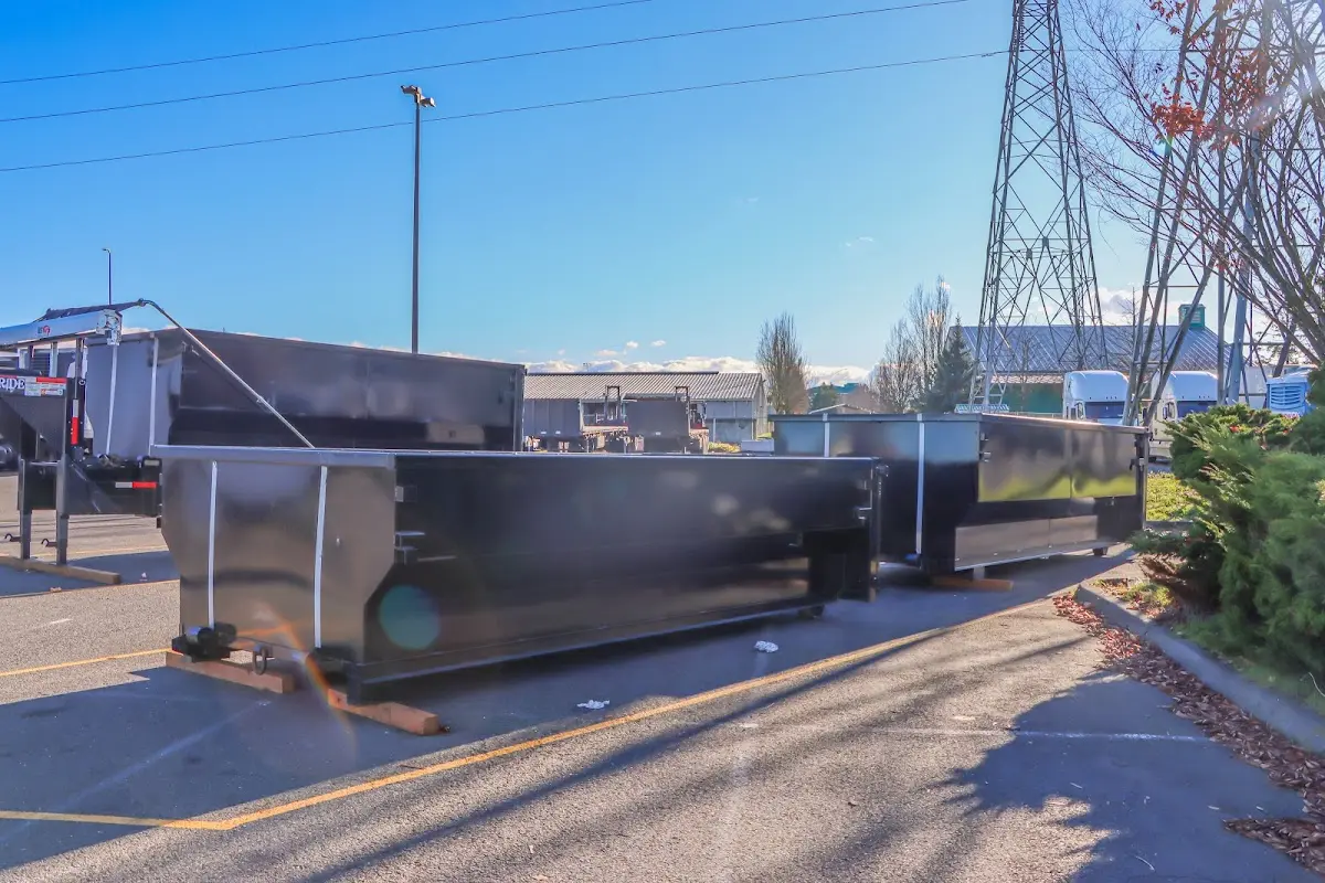 Roll-off dumpster ready for waste disposal at job site for Concrete Dumpster Rental in Dalton